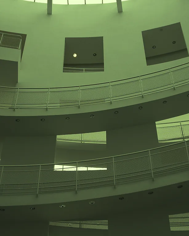 White curved balconies of a museum atrium