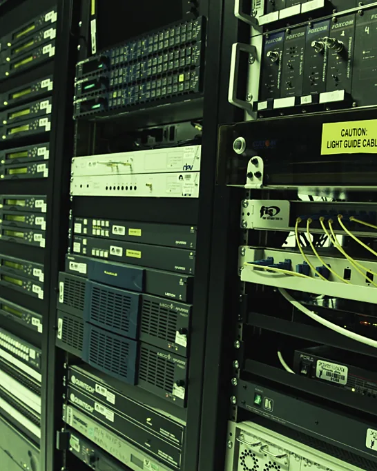 Server racks packed with cables and blinking hardware